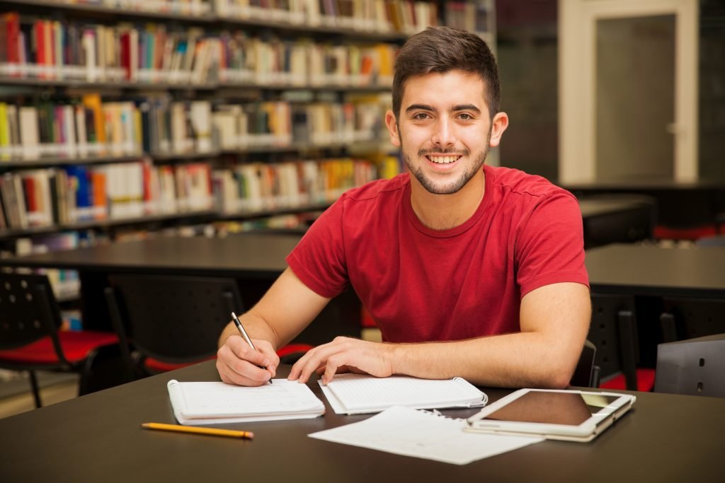 Student researching programme costs and scholarship options